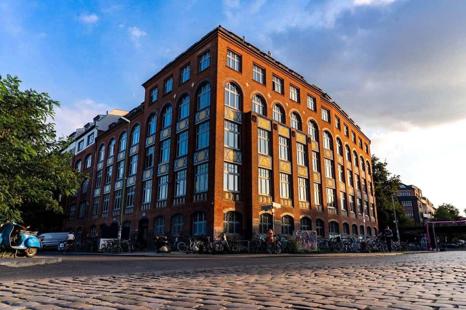 The brick building of CIC Berlin on Lohmuehlenstrasse in evening light